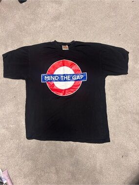 Underground Black Tee with Orange Tag and Red Graphic